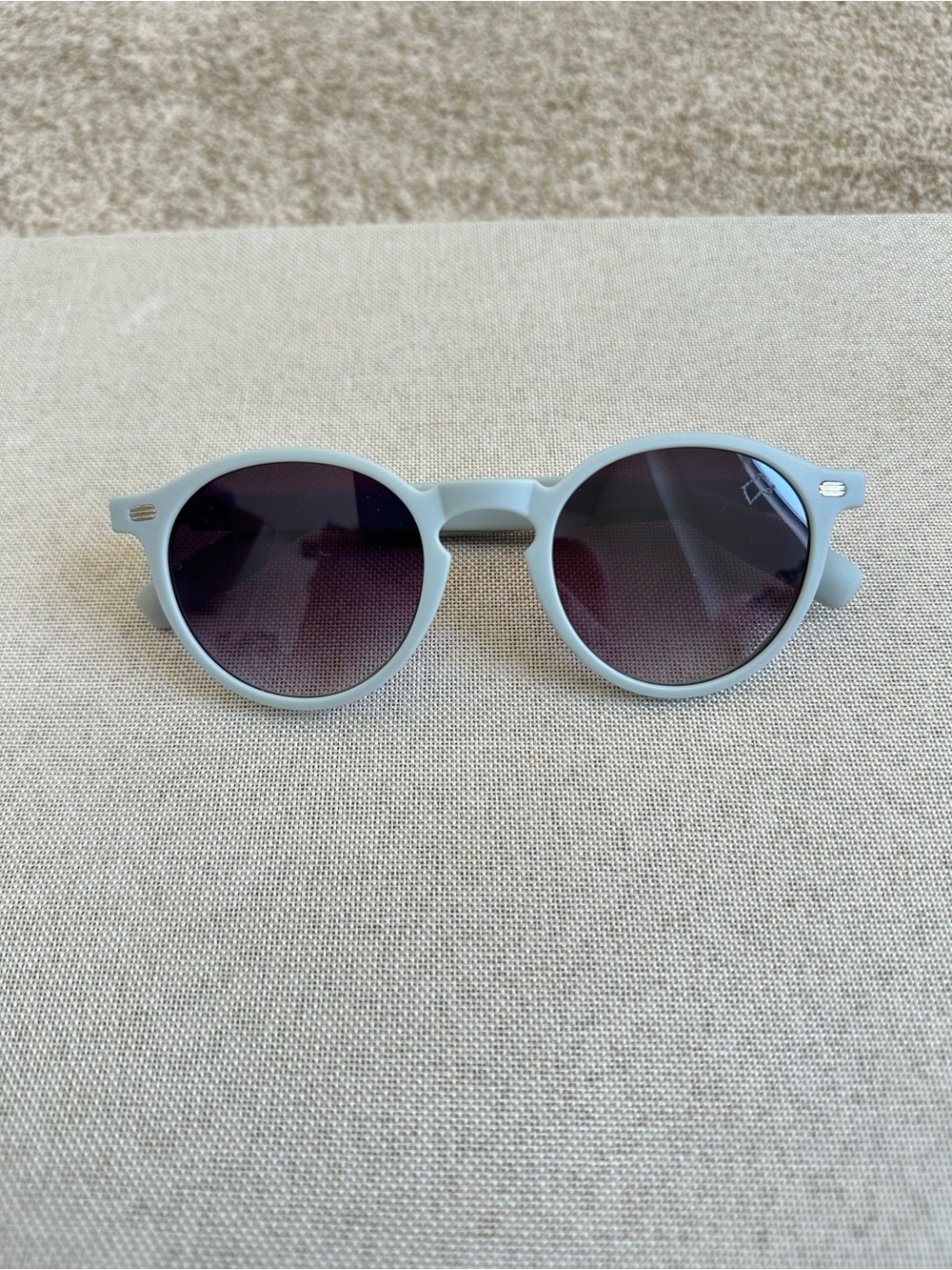 Women’s Round Light Blue Sunglasses with Dark Lenses